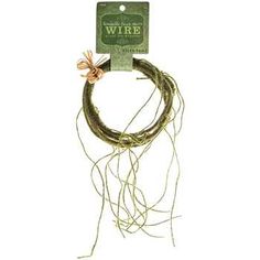 the wire is wrapped in green and has pink flowers on each end, along with an orange ribbon