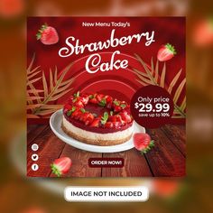 an advertisement for a strawberry cake on a wooden table