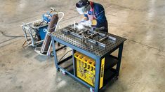 a man working on an assembly line in a factory