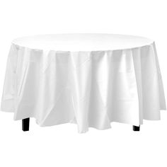 a round table with white cloth on it