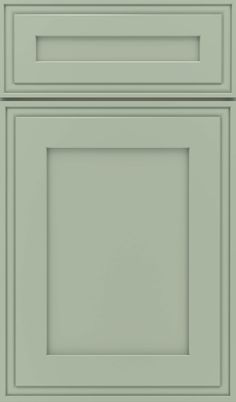 an image of a kitchen cabinet door in light green color, with the bottom panel painted white