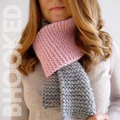 a woman wearing a pink and grey knitted neckwarf with a matching scarf