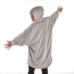 Details Take your cue from the brand that made wearing your blanket a thing. Snuggle up in The Comfy whether watching TV, camping or enjoying outdoor sporting events. The buttery-soft gray blanket features a huge plush hood, giant front pocket, oversized sleeves and body with a cozy Sherpa lining. Cozy wearable blanket makes a great gift for birthdays, holidays, graduation and more. The Comfy polyester wearable blanket features soft gray exterior and white Sherpa interior.  Machine wash cold separately on gentle cycle. Only non-chlorine bleach when needed. Tumble dry at low temperature.  Do not iron or dry clean.  Imported. One size fits most adults. 2 Brothers, Play Video Games, Grey Exterior, Oversize Sleeves, The Comfy, Blanket Sweater, Comfort Blanket, Gray Blanket, Wearable Blanket