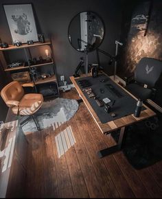 a room with a wooden floor and black walls