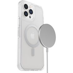 an iphone case with a charger attached to the back of it and a round metal object in front