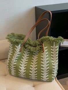 Elevate your beach day style with our Summer Chic Straw Fringed Tote Bag. Made from high-quality straw and featuring playful fringe details, this tote is both fashionable and functional. Perfect for storing your beach essentials, this bag is a must-have for any summer adventure. Color : Green Strap Type : Double Handle Details : Fringe Bag Size : Large Style : Vacation Type : Shoulder Tote Bag Closure Type : Buckle Pattern Type : Colorblock Features : High-capacity Material : Polyester Compositi Trendy Summer Beach Bag With Tassels, Trendy Woven Beach Bag, Green Woven Crochet Bag For Beach Season, Green Beachy Tote Beach Bag, Trendy Woven Tote Beach Bag, Trendy Beach Straw Bag With Tassels, Summer Beach Bag With Tassels For Shopping, Bohemian Green Straw Bag, Green Handwoven Beach Bag For Summer