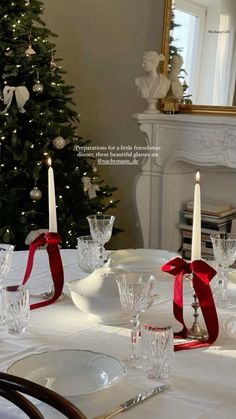 a dining room table set for christmas dinner