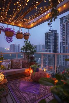 an outdoor living area with plants and lights on the ceiling, in front of a cityscape