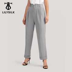 PREMIUM PLAIN TUCKED TAPERED PANTS Add a touch of sophistication to your wardrobe with these Women's Plain Tucked Tapered Pants. Crafted with premium elastics, these lightweight pants feature a flattering pleat front waist and a tailored, tapered fit with turn-ups for a professional look. Perfect for the office or leisure time, these trousers provide a comfortable yet stylish solution. Lightweight and soft, the Pleat Front Tapered Silk Pants provide the ultimate comfort for any occasion. Whether Trouser Suit, Lightweight Pants, Silk Trousers, Silk Pants, Tapered Pants, Fitted Trousers, Cropped Trousers, Trouser Suits, Turn Up