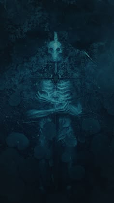 a skeleton sitting in the middle of water with lily pads on it's side