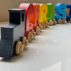 a toy train with the letters sr on it