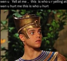 an egyptian man wearing a golden crown and gold jewelry with the caption, when u yell at me this is who u r