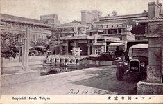 an old black and white photo of some buildings