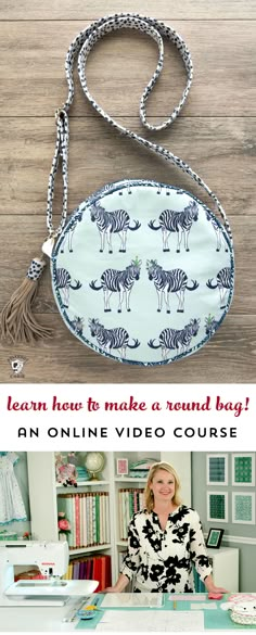 a woman sitting at a desk in front of a purse with zebras on it