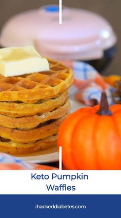 the keto pumpkin waffles are stacked on top of each other and topped with butter