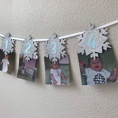 a baby's first birthday banner with snowflakes