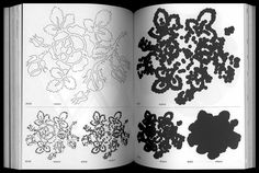 an open book with black and white drawings on it's pages, including flowers