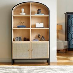 a book shelf with books and other items on it