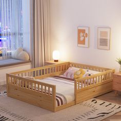 a bed room with a neatly made bed and a night stand next to a window