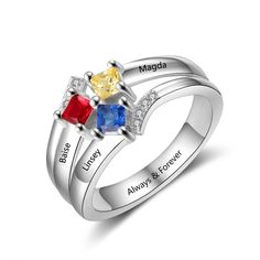 three stone ring with names engraved on the side and two different colored stones in each