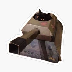 a black cat peeking out from behind a tank sticker