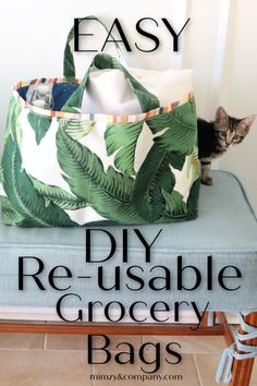 an easy diy reusable grocery tote bag with a cat sitting next to it