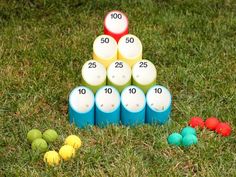 several balls are stacked on top of each other in front of the number one game