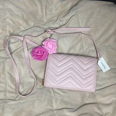 Francesca’s Light Pink Cross Body Purse New With Tags Attached. Straps Are Removable. Crossbody Purse With Gold Buckles That Hock To Make A Crossbody Purse. Wallet Like. Card Holder Slot In Inside. Can’t Fit That Much Stuff (Probably Just Wallet, Phone, Lipstick, And Small Keys). Color: Light Pink Measurements: 8 X 5.5 Inches Note: From A Pet And Smoke Free Home. Light Pink Purse, Black Pointed Toe Flats, Circle Purse, Grey Crossbody Bag, Wicker Purse, Pink Cross, Brown Crossbody Bag, Pink Crossbody Bag, Faux Leather Purse