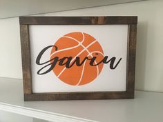 an orange and white sign with the word gavri written in black on it