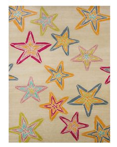 an area rug with multicolored stars on it