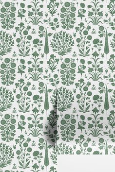 green and white wallpaper with flowers, plants and trees on it's side