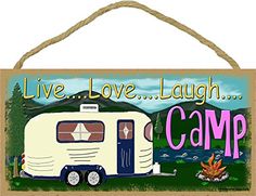 a sign that says live love laugh laugh camp with an rv on the front and back