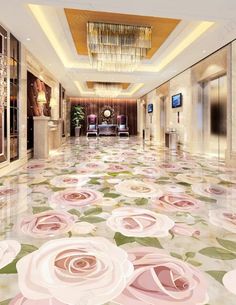 the floor is covered with pink flowers and chandeliers in an elegant hotel lobby