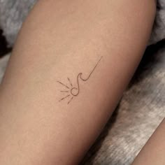 a woman's leg with a tattoo on it and the word love written in cursive writing