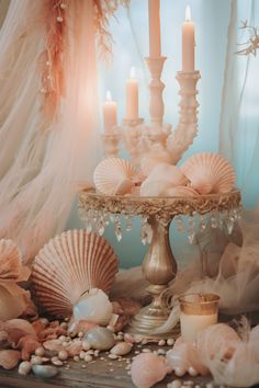 Whimsical mermaid core decor inspiration featuring a candle surrounded by seashells in creamy pinks and dreamy tones. Vintage vibes with a touch of tropical baroque allure. Mermaid Core Aesthetic, Whimsical Mermaid, Sunset Beach Weddings, Aphrodite Aesthetic, Core Decor, Ocean Room, Mermaid Bathroom, Mermaid Room, Mermaid Core