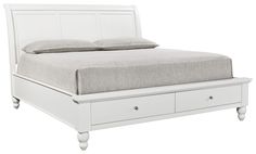 a white bed with two drawers underneath it and a pillow on the top of the headboard