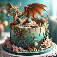 a cake decorated with flowers and a dragon on top