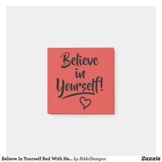 a red square sticker with the words believe in yourself written on it and hearts