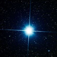 the bright star is shining brightly in the dark sky