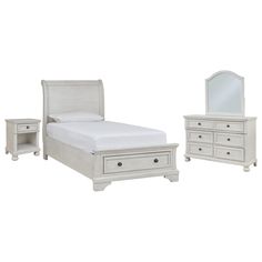 a white bed with two drawers and a mirror