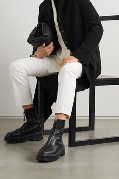 Black Leather ankle boots | The Row | NET-A-PORTER Shoes Boots Combat, How To Wear Ankle Boots, White Clothing, High Ankle Boots, Shoes Boots Ankle, Zipper Shorts, Trending Boots, Black Leather Ankle Boots, Fashion 101