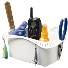 a bath tub filled with different types of fishing gear and items to use in it