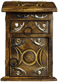 an ornate wooden cabinet with metal accents on the front and sides, against a white background