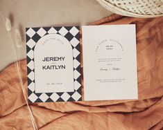 an image of wedding stationery on the bed