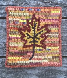 the craft kit is made with yarn and leaves