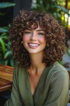 Embrace the beauty of curly hairstyles with this dynamic choppy layers look! Perfect for adding movement and texture, the choppy layers beautifully frame your face while enhancing the natural bounce of your curls. This hairstyle not only elevates your curls but also offers a playful vibe that’s ideal for any occasion. Discover how choppy layers can transform your curly hairstyles into a statement of style! Woman Curly Haircut, Haïr Cuts For Curly Hair, Short Hair With Curly Hair, Hair Color Idea For Curly Hair, Curly Short Layered Haircuts, Curly Haircuts Short Layers, Highlights For Curly Hair Natural Curls Brunettes, Short Curly Layered Haircuts, Hair Color For Curly Hair Natural Curls