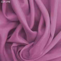 a close up image of a pink fabric