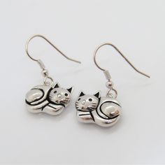 Vintage Sterling Silver Cat Dangle Earrings...Marked 925...Total of weights 4.0grams...Measure H 1'' W 1/2''...These are very good condition. Cat Design Metal Drop Earrings, Metal Cat Design Drop Earrings, Silver Cat Design Drop Earrings, Silver Drop Earrings With Cat Design, Silver Cat Design Dangle Earrings, Sterling Silver Cat, Silver Cat, Cat Jewelry, Cat Earrings