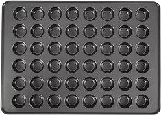 a black muffin pan with lots of holes on the front and bottom, for making cupcakes