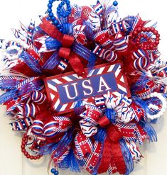 a patriotic wreath with the word usa on it